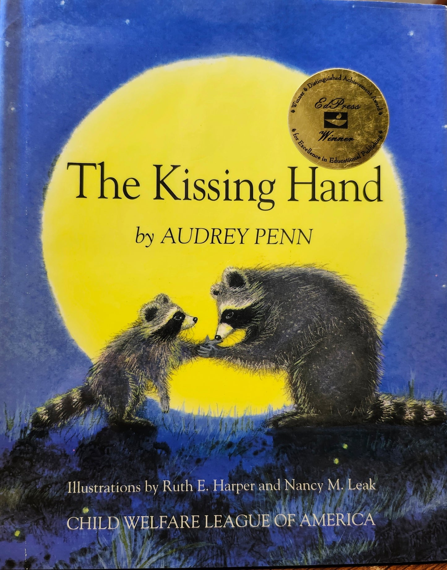 "The Kissing Hand" by Audrey Penn (author), Ruth E. Harper and Nancy M. Leak (illustrators)