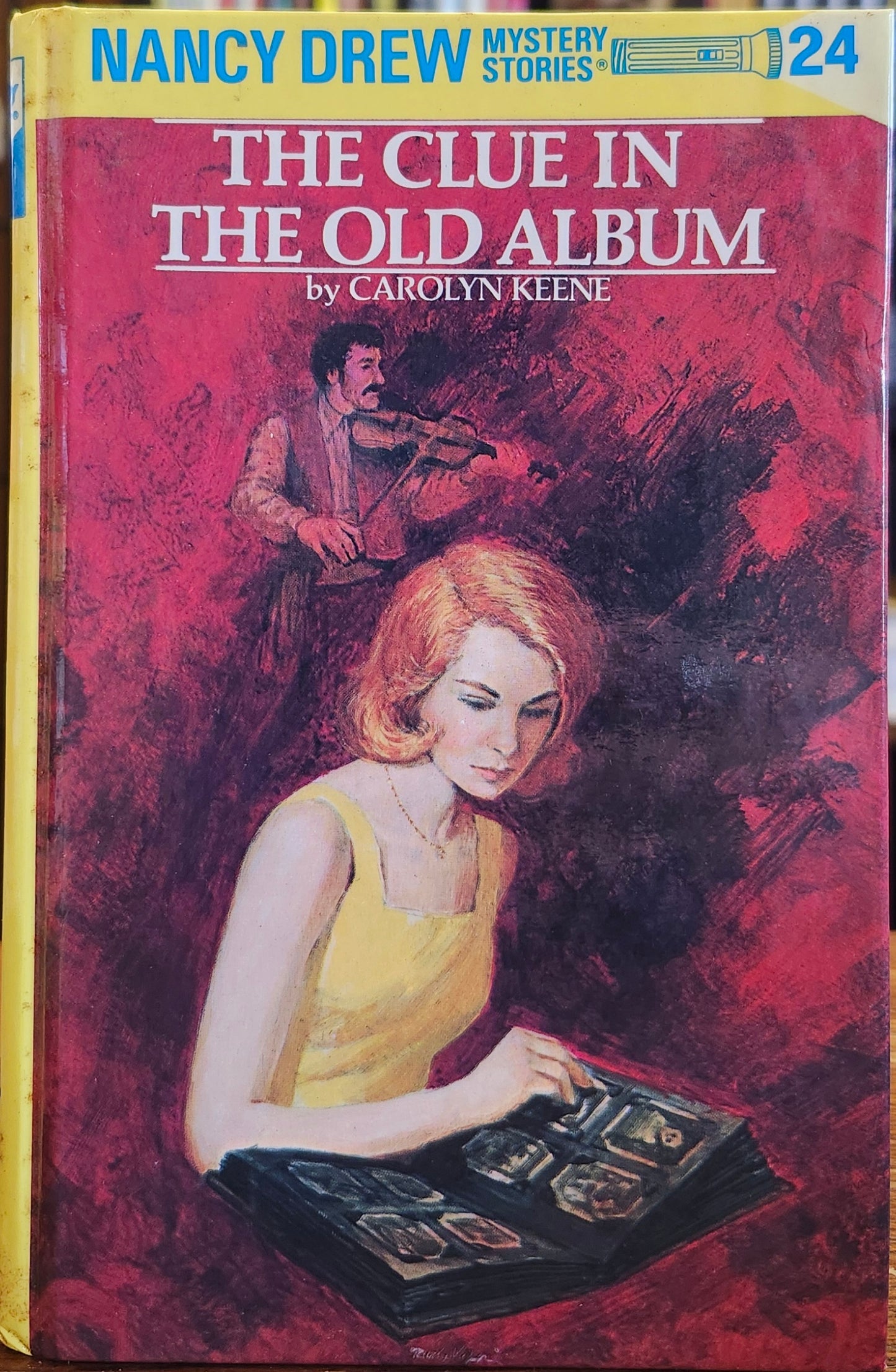 "The Clue in the Old Album" by Carolyn Keene (Nancy Drew, Flashlight 24)