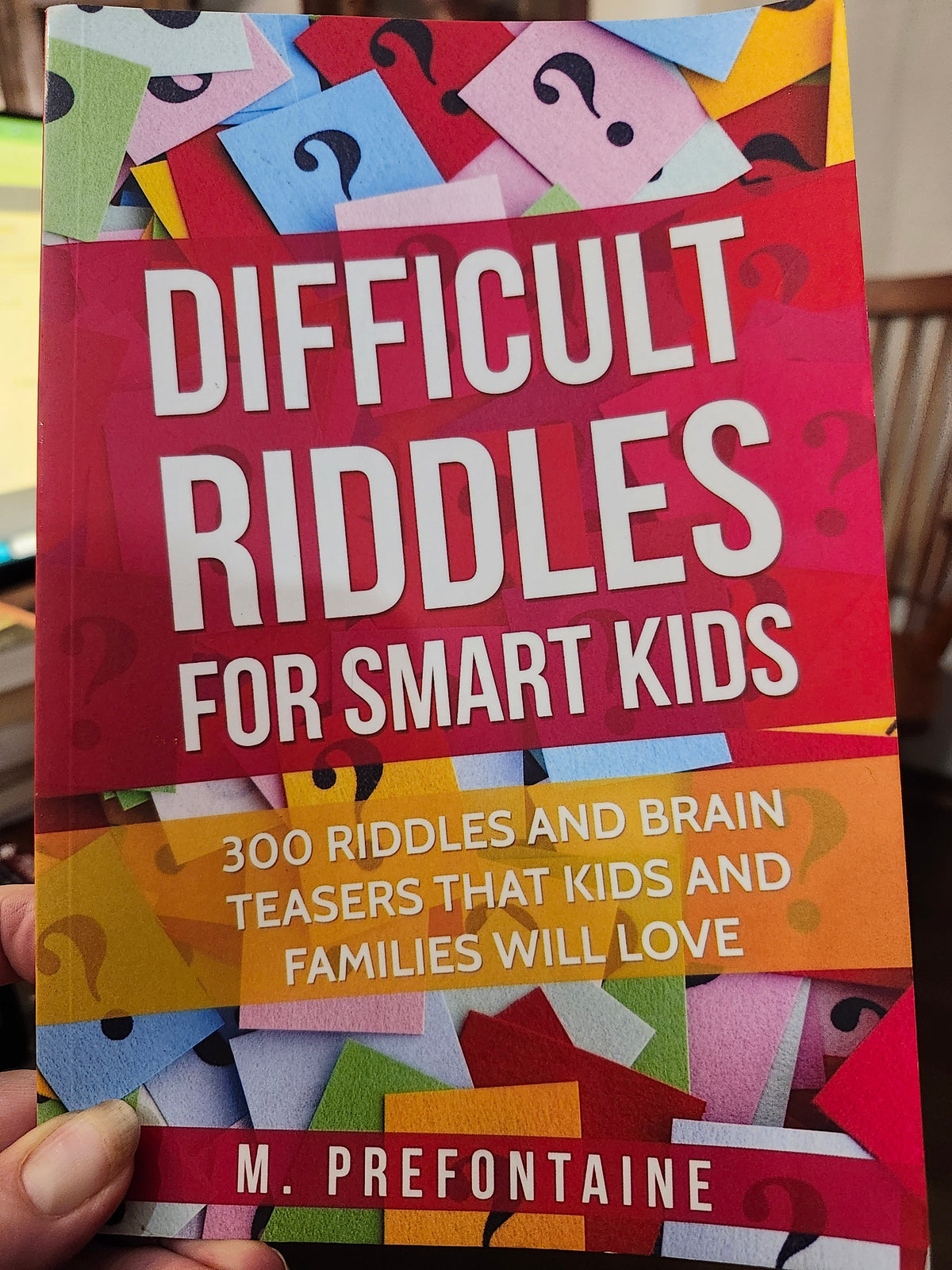 "Difficult Riddles for Smart Kids: 300 Riddles and Brain Teasers That Kids and Families Will Love" by M. Prefontaine