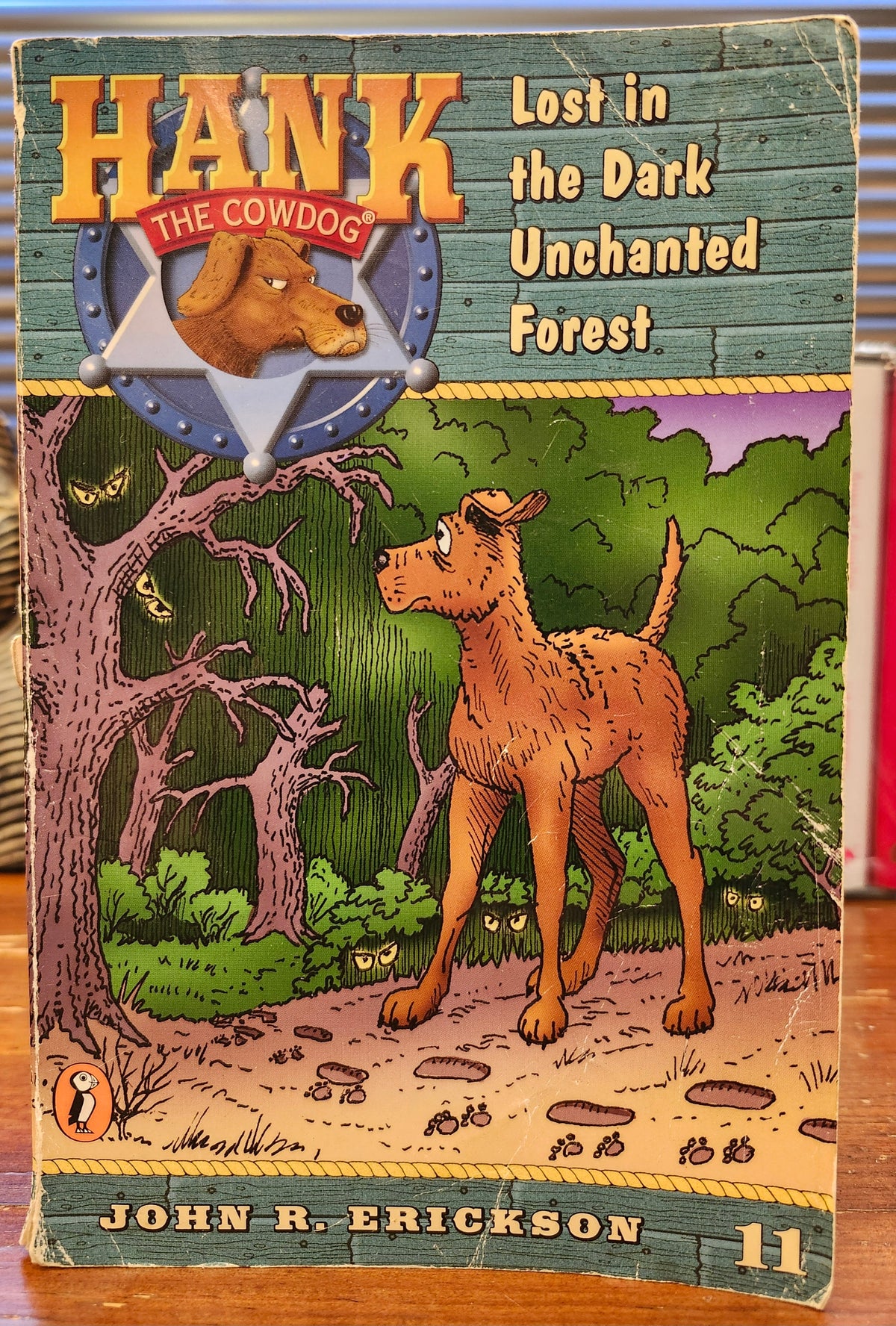 "Hank the Cowdog: Lost in the Dark Unchanted Forest" by John Erickson (Book 11)