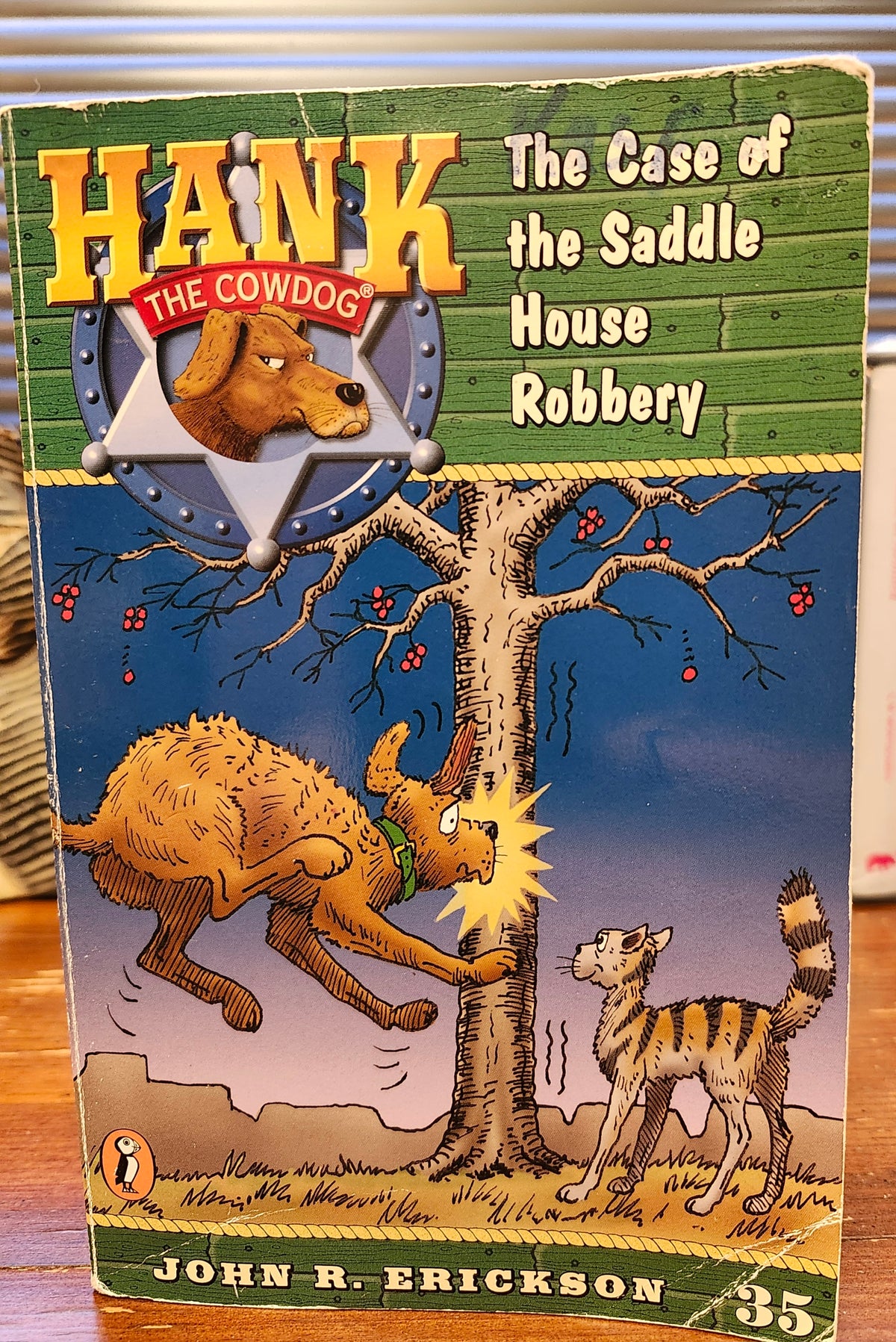 "Hank the Cowdog: The Case of the Saddle House Robbery" by John Erickson (Book 35)