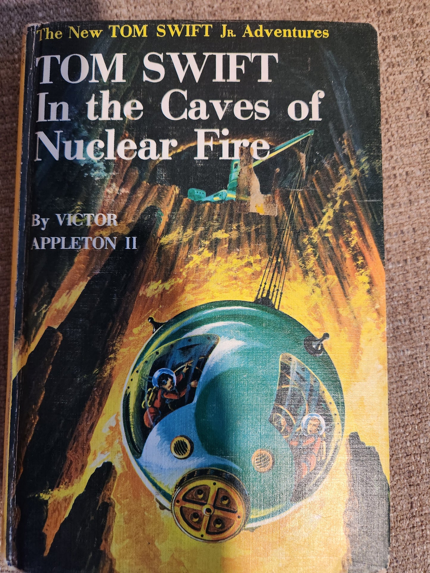 "Tom Swift In the Caves of Nuclear Fire" by Victor Appleton II (Blue Spine)(Yellow spine)