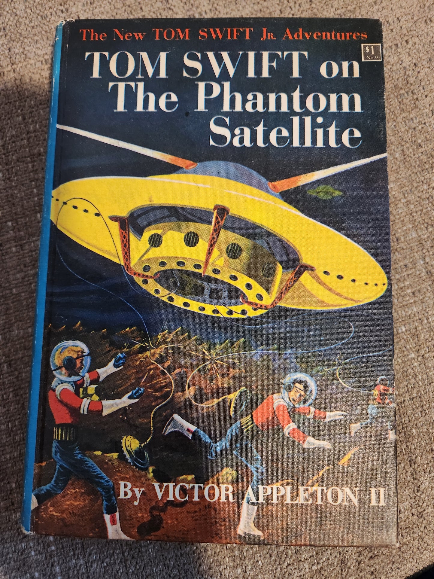 "Tom Swift on The Phantom Satellite" by Victor Appleton II (Blue Spine)
