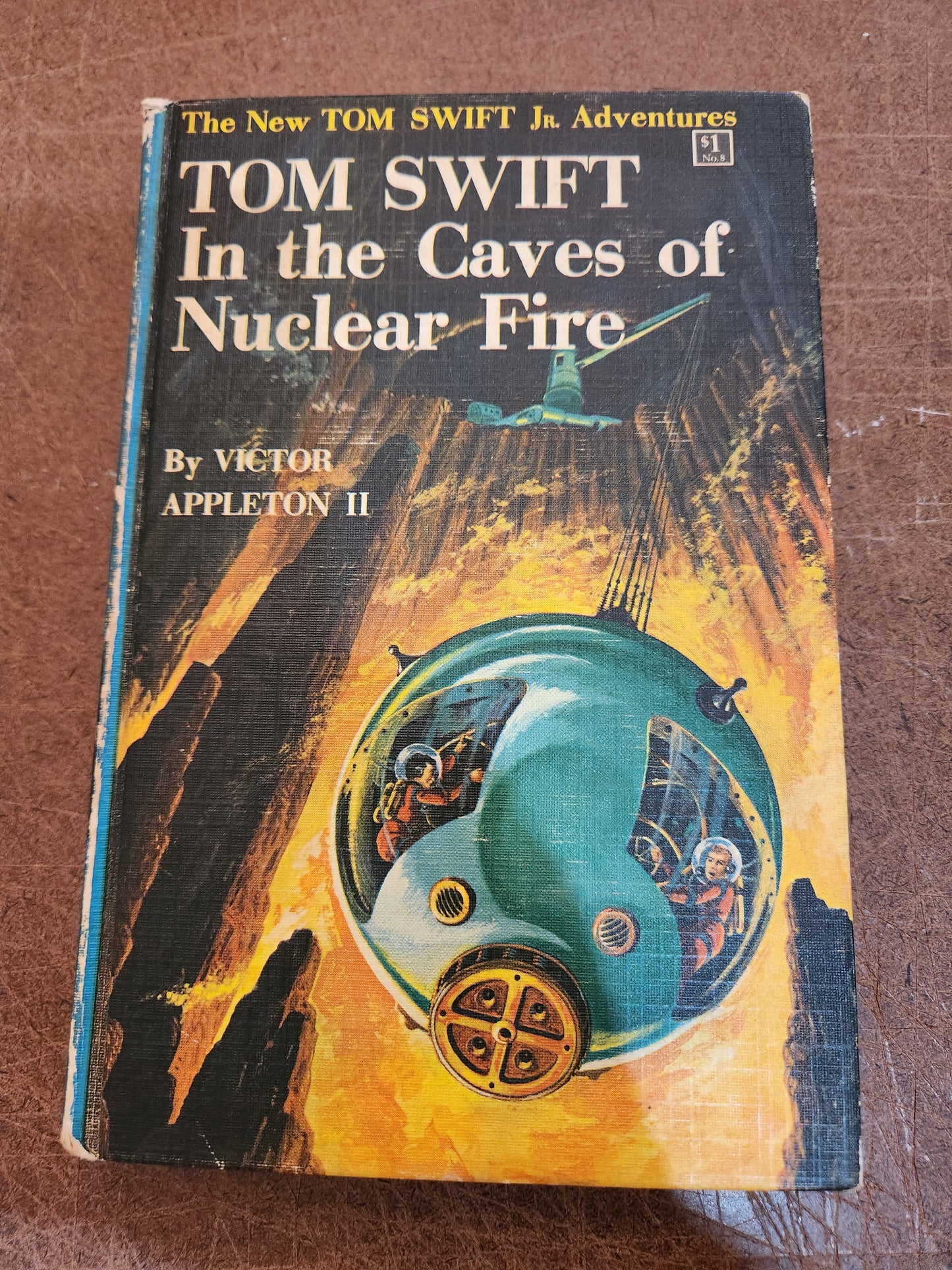 "Tom Swift In the Caves of Nuclear Fire" by Victor Appleton II (Blue Spine)(Yellow spine)