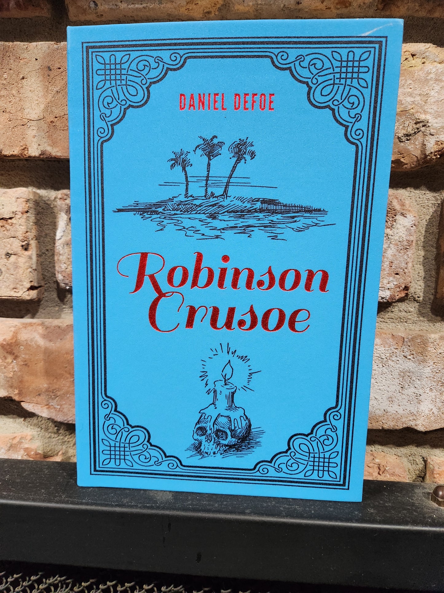 "Robinson Crusoe" by Daniel Defoe