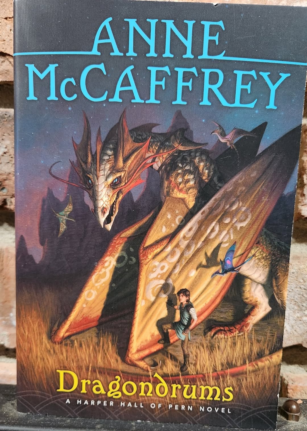 "Dragondrums" by Anne McCaffrey (Book 3 in the Harper Hall Trilogy) -- New