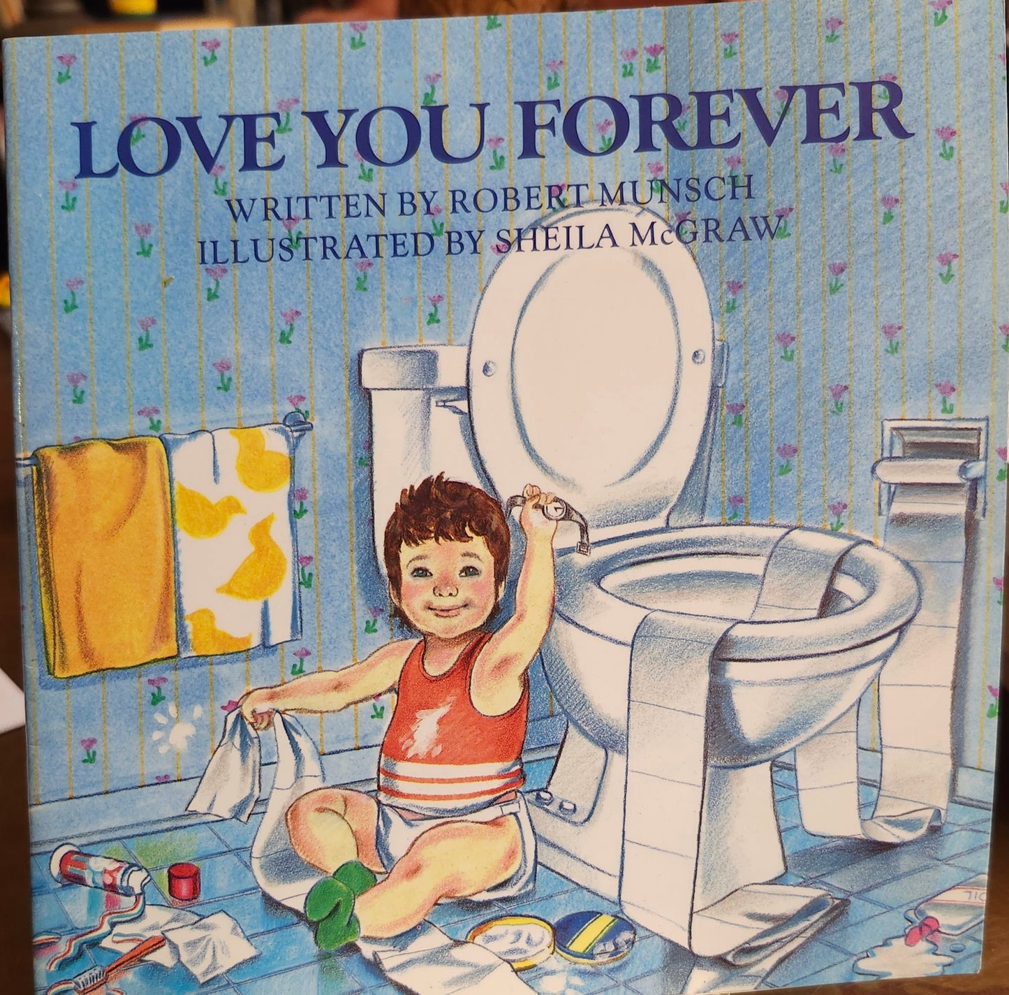 "Love You Forever" by Robert Munsch (author), Sheila McGraw (illustrator)