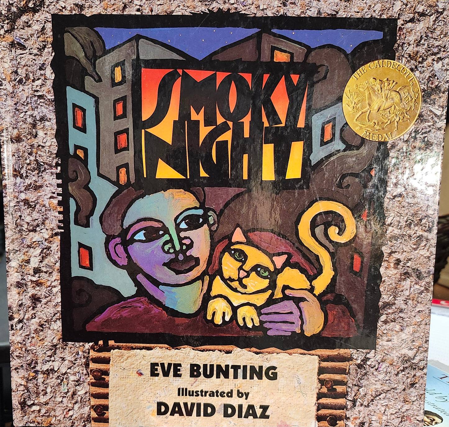 "Smoky Night" by Eve Bunting (author) David Diaz (illustrator)