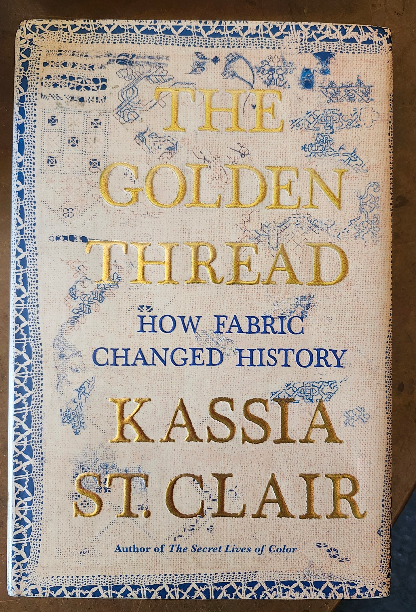 "The Golden Thread: How Fabric Changed History" by Kassia St. Clair