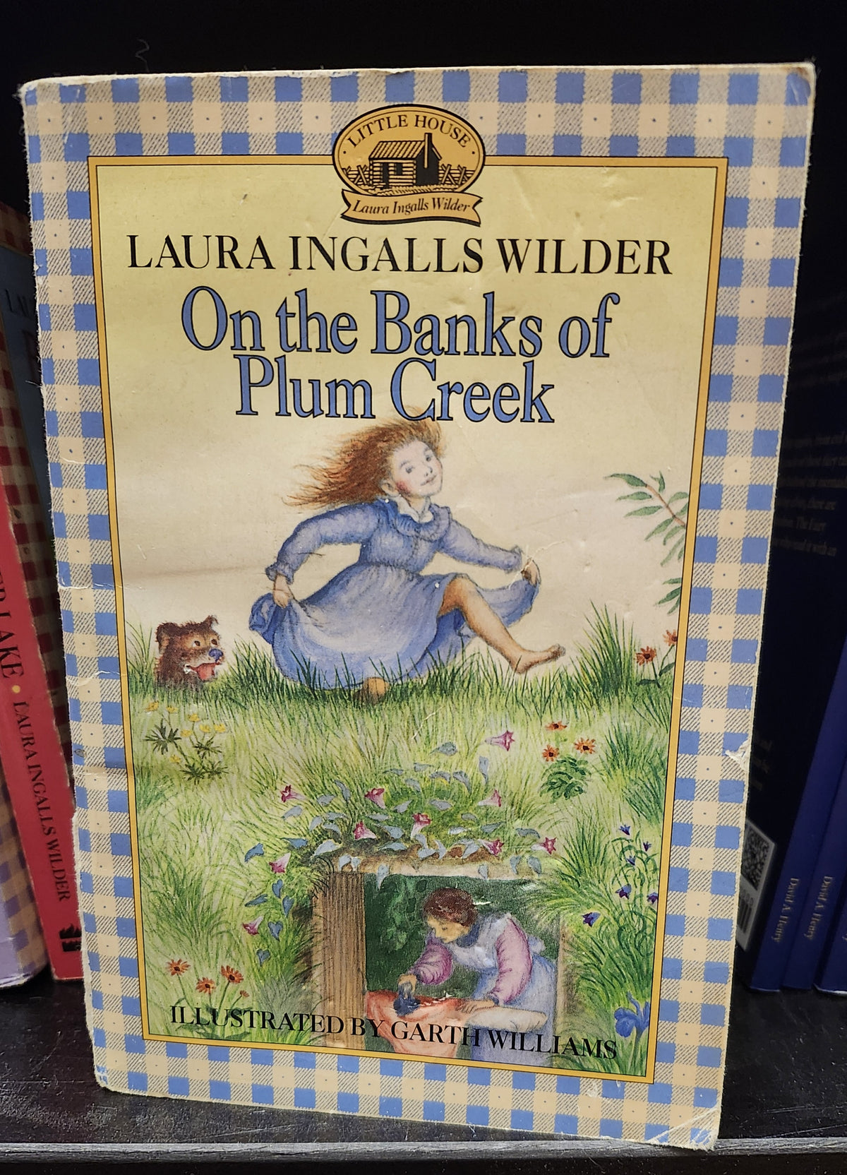 "On the Banks of Plum Creek" by Laura Ingalls Wilder (author) and Garth Williams (illustrator) (Little House on the Prairie series, Book 4)