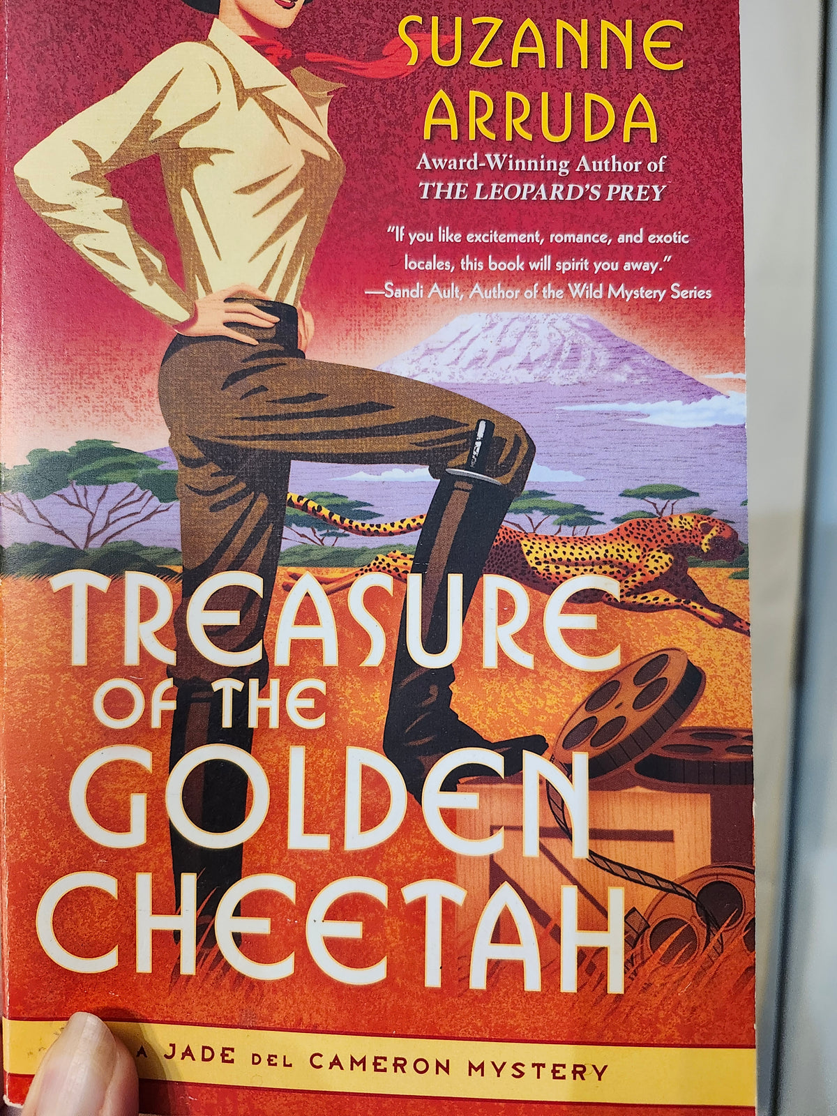 "Treasure of the Golden Cheetah" by Suzanne Arruda (A Jade del Cameron Mystery, Book 5)