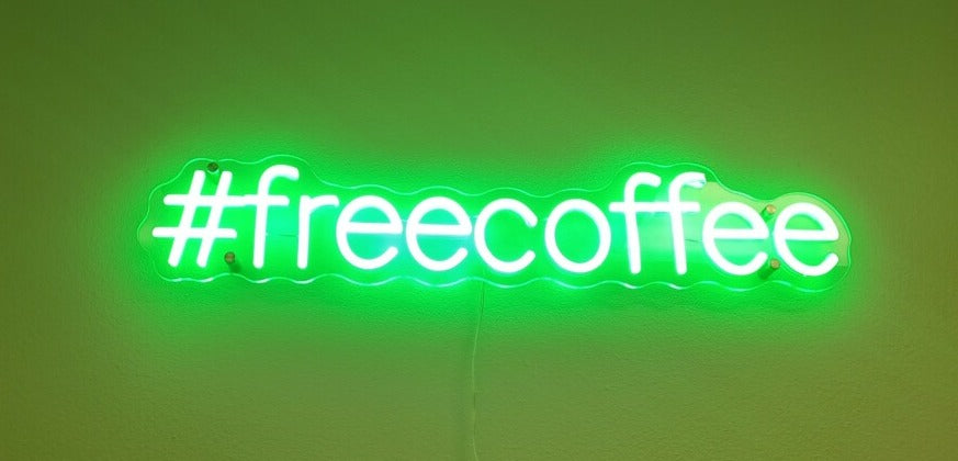 #freecoffee neon sign above our coffee station in the shop - Dead Tree Dreams Bookstore